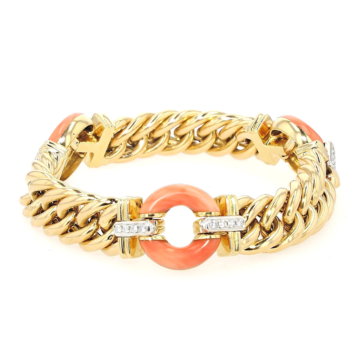 Vintage bracelet made in Italy in 750 yellow gold with brilliants and corals, lying frontally