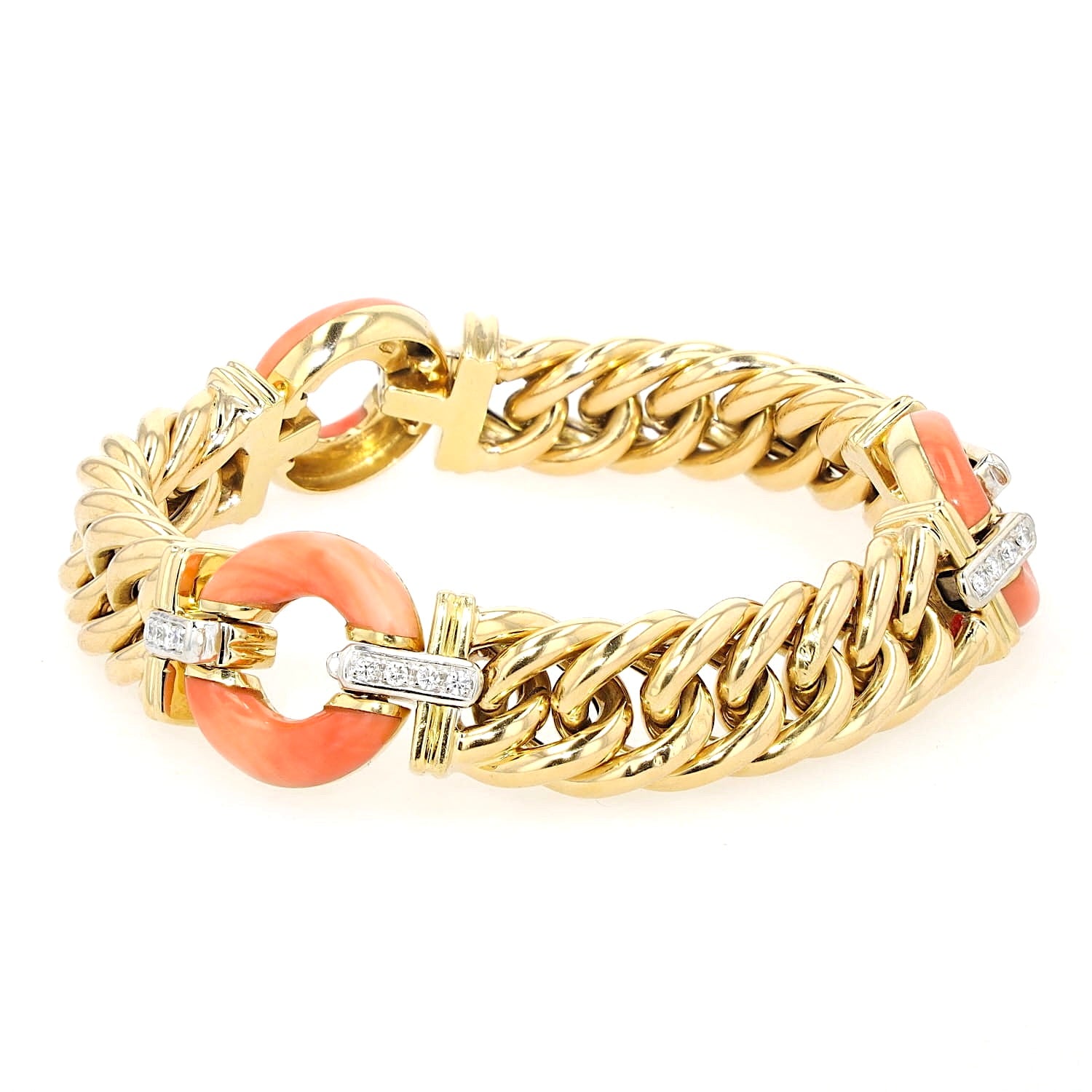 Vintage bracelet made in Italy in 750 yellow gold with brilliants and corals, twisted horizontally to the left