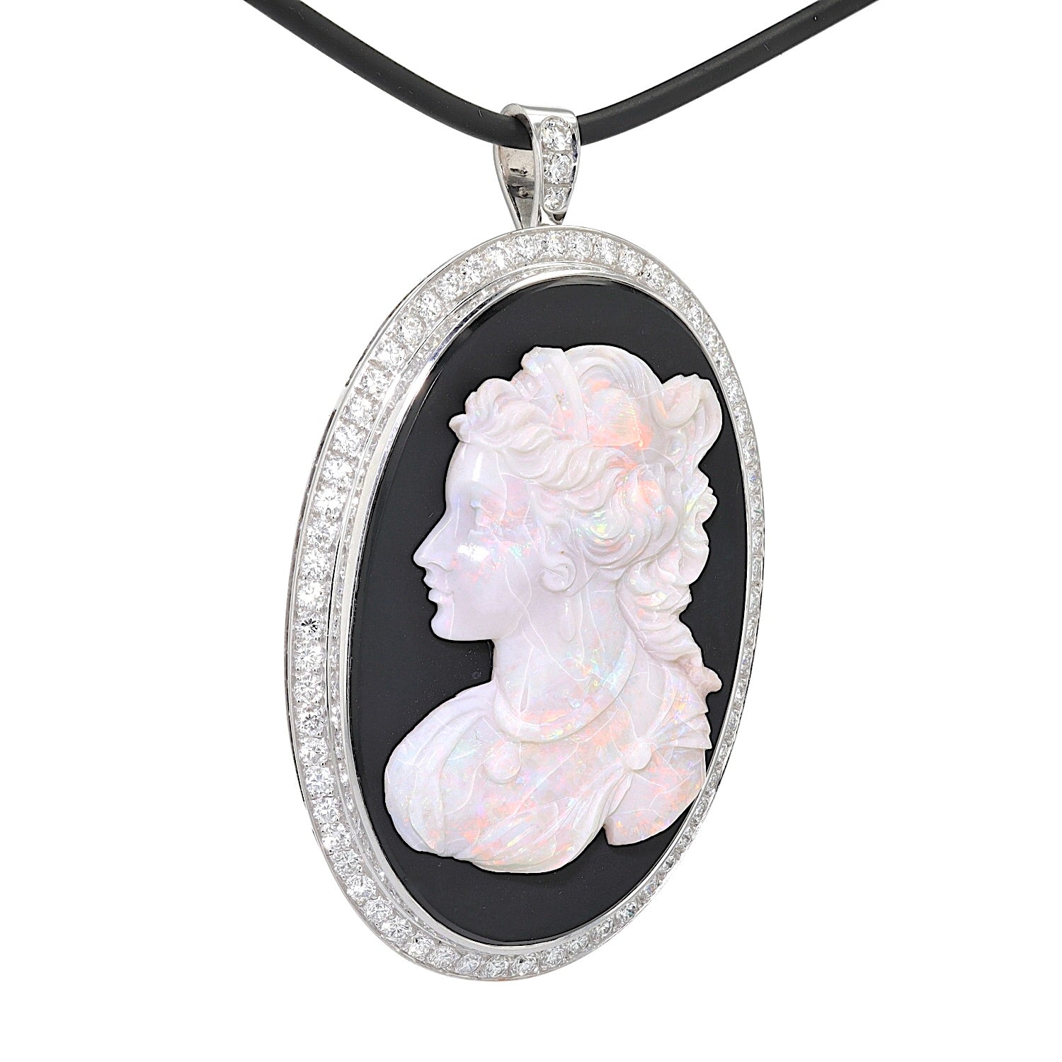 Pendant in 750 white gold with onyx plate, precious opal and brilliants, hanging turned to the right