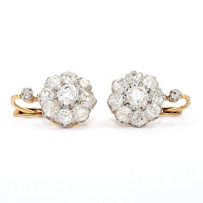 1 pair of earrings, France around 1910 in 750 yellow gold, platinum with diamonds, lying frontal