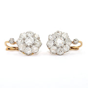 1 pair of earrings, France around 1910 in 750 yellow gold, platinum with diamonds, lying frontal