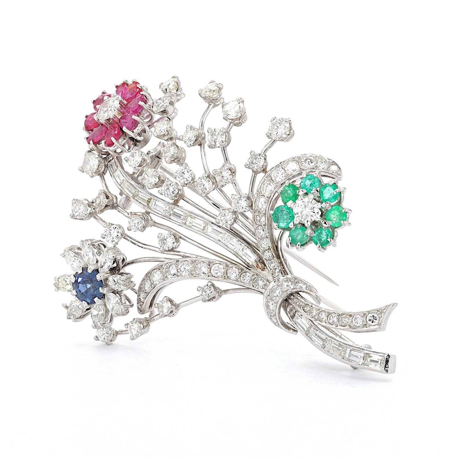 Brooch in platinum with diamonds, brilliants, rubies, sapphires and emeralds, standing inks turned