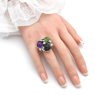 Ring in 750 gold rhodium-plated with amethyst, tourmalines and brilliants, on the hand