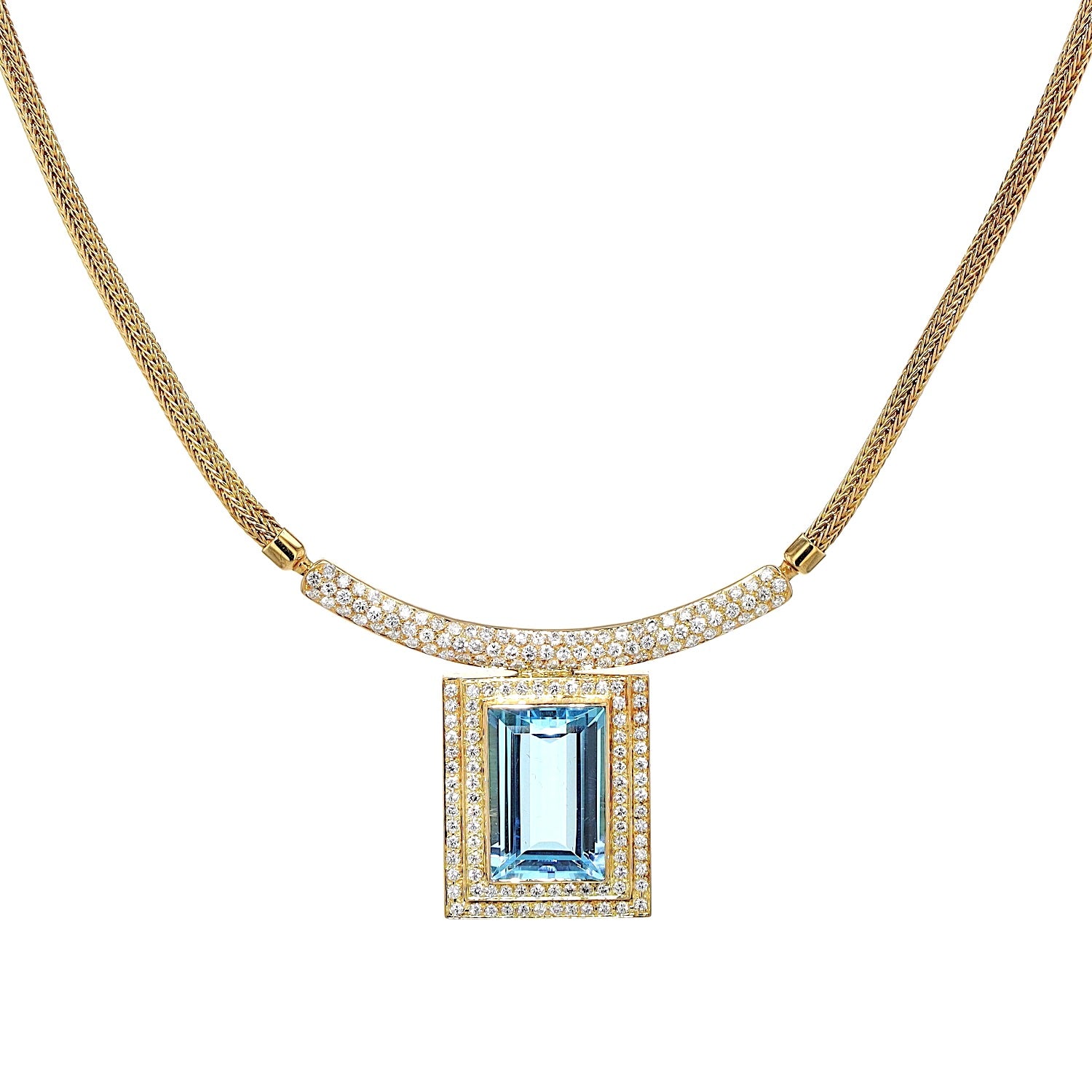 Necklace in 750 yellow gold with a blue precious topaz and brilliants, hanging frontally