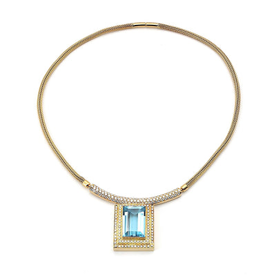 Necklace in 750 yellow gold with a blue precious topaz and brilliants, horizontal top view