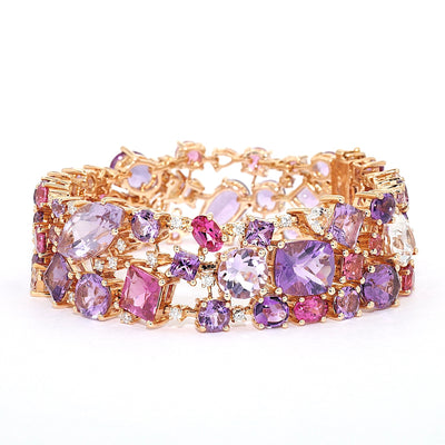 Bracelet by Buchwald in 750 rose gold with amethysts, tourmalines, sapphires, rubellites, morganites and brilliants, turned horizontally to the left