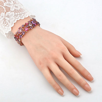 Bracelet by Buchwald in 750 rose gold with amethysts, tourmalines, sapphires, rubellites, morganites and brilliants, on the arm