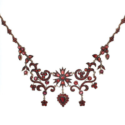 Antique and unusual tombac garnet necklace, gold-plated, hanging frontally