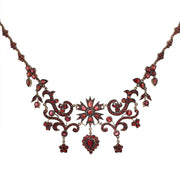 Antique and unusual tombac garnet necklace, gold-plated, hanging frontally