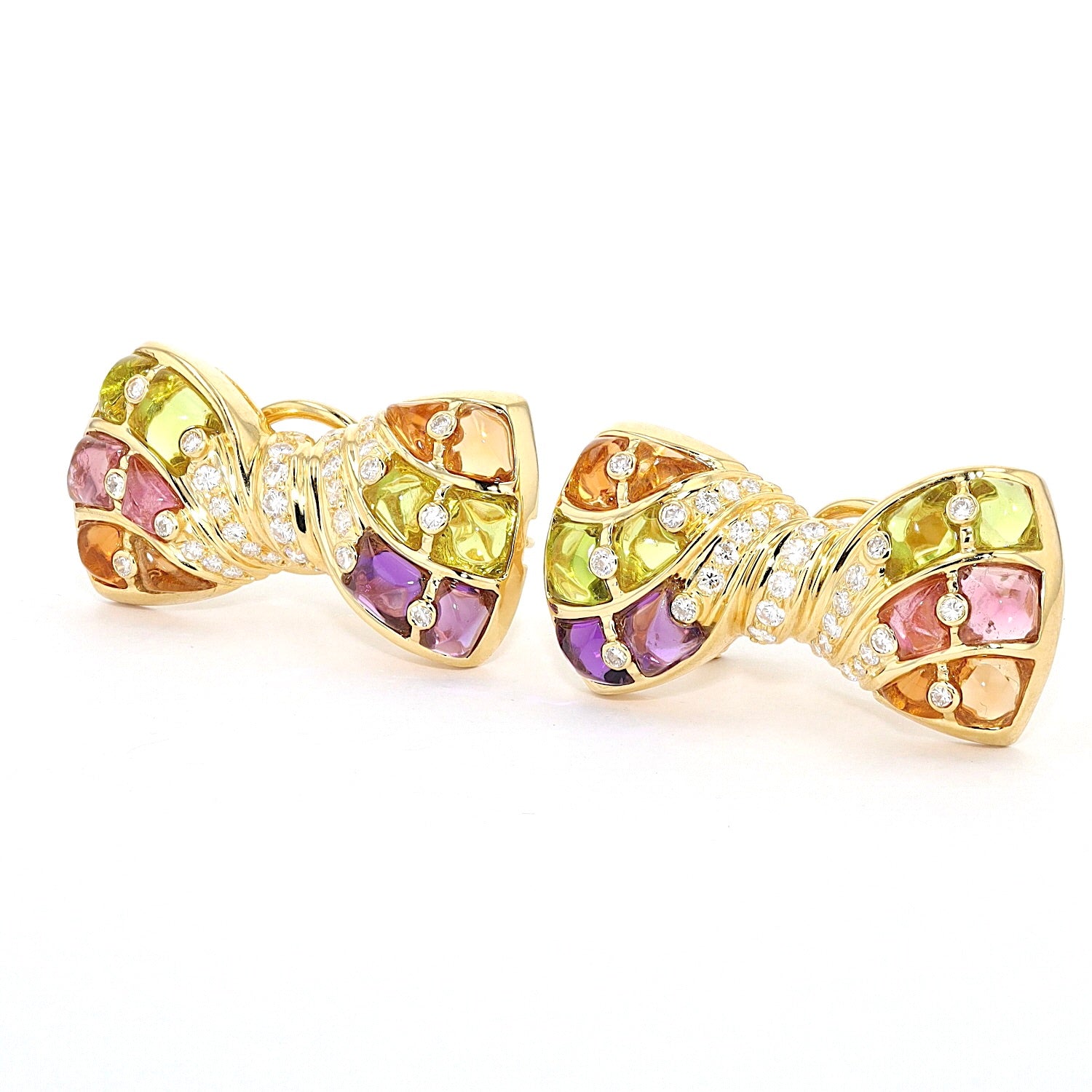 1 pair of stud earrings in 750 yellow gold with brilliants, amethysts, citrines, tourmalines, green glass, turned horizontally to the left