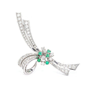 Brooch in 750 white gold with brilliants, diamonds and emeralds, standing frontal