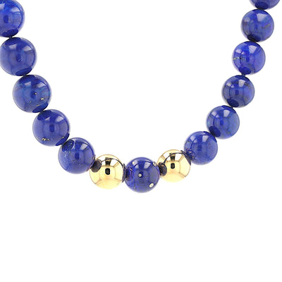 Necklace with large lapis lazuli beads, brilliants and 750 gold, hanging, twisted to the right