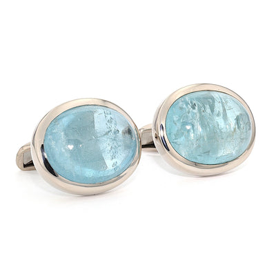 Large cufflinks in 750 white gold with aquamarine cabochons, turned horizontally to the right