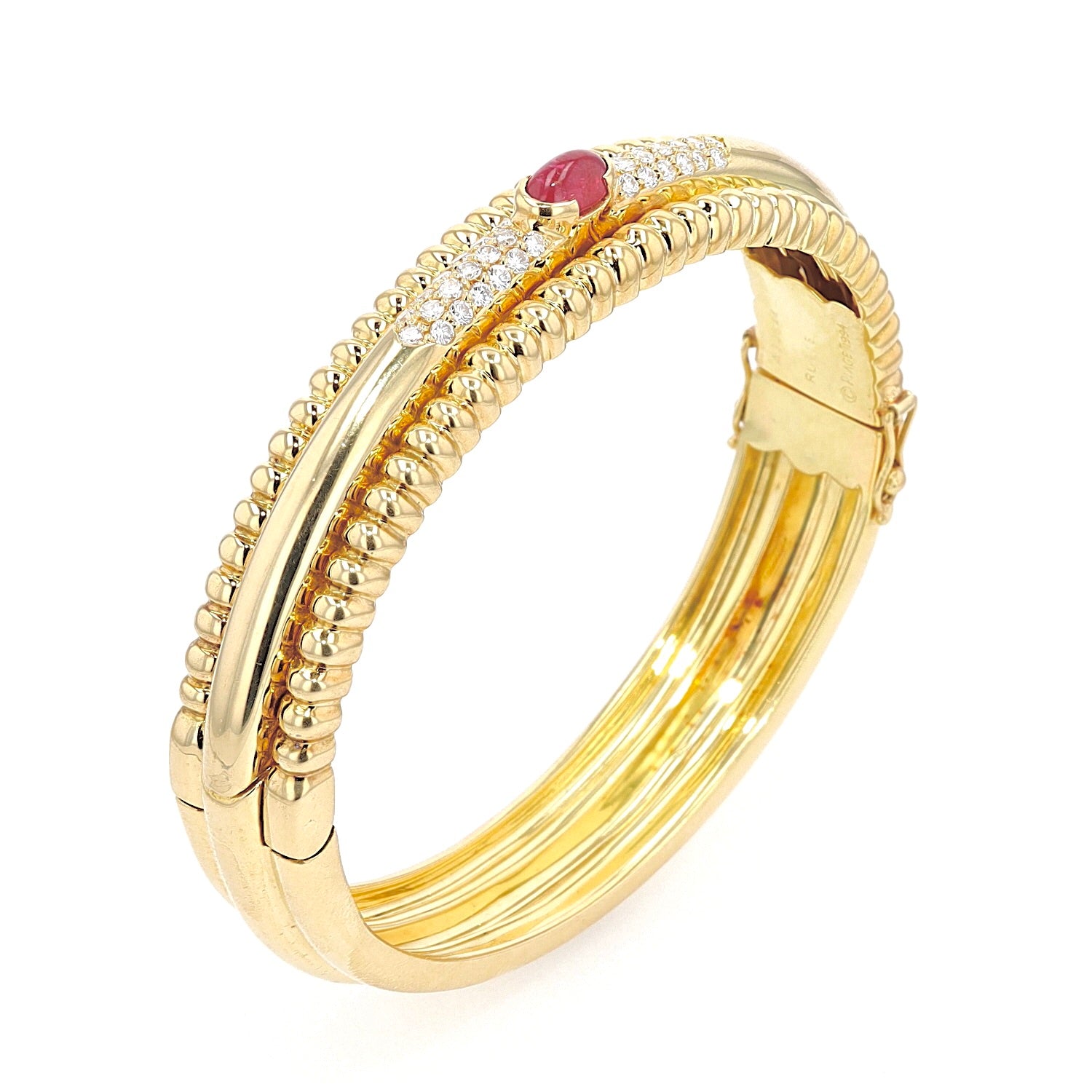 Exclusive Piaget bangle in 750 yellow gold with a Ruby and brilliants, standing