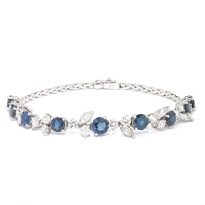 Vintage bracelet in 750 white gold with diamonds, brilliants and sapphires, lying frontally