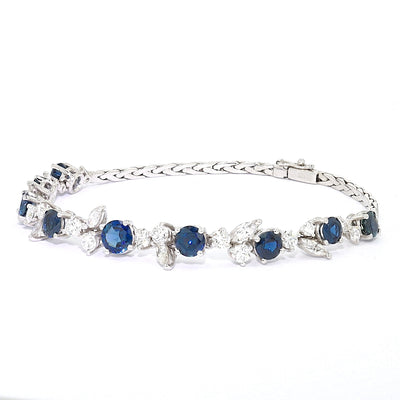 Vintage bracelet in 750 white gold with diamonds, brilliants and sapphires, turned horizontally to the left