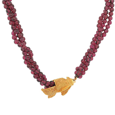 Ehinger Schwarz necklace made of rhodolite spheres and a lock in 750 yellow gold, hanging right-hand twisted