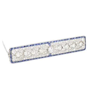 Large Art Déco brooch in 900 platinum with a total of approx. 2.7 ct diamonds and 62 sapphires, turned horizontally to the right