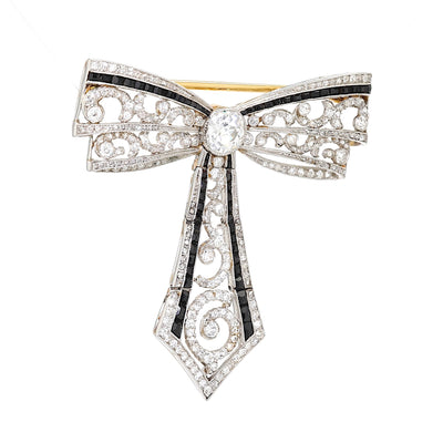  Brooch from around 1900, probably by Fr. Kreuter & Co. Hanau in platinum/750 yellow gold set with diamonds and gagat, standing turned to the right