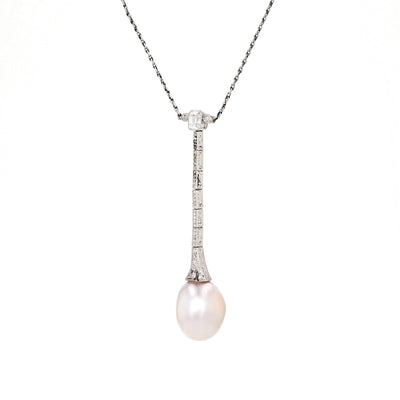 Art Deco necklace in platinum with a large natural pearl and diamonds, hanging twisted to the left