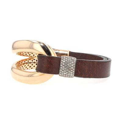 Oromalia bracelet in 750 rose gold with approx. 1 ct brilliants and a leather strap, lying frontally