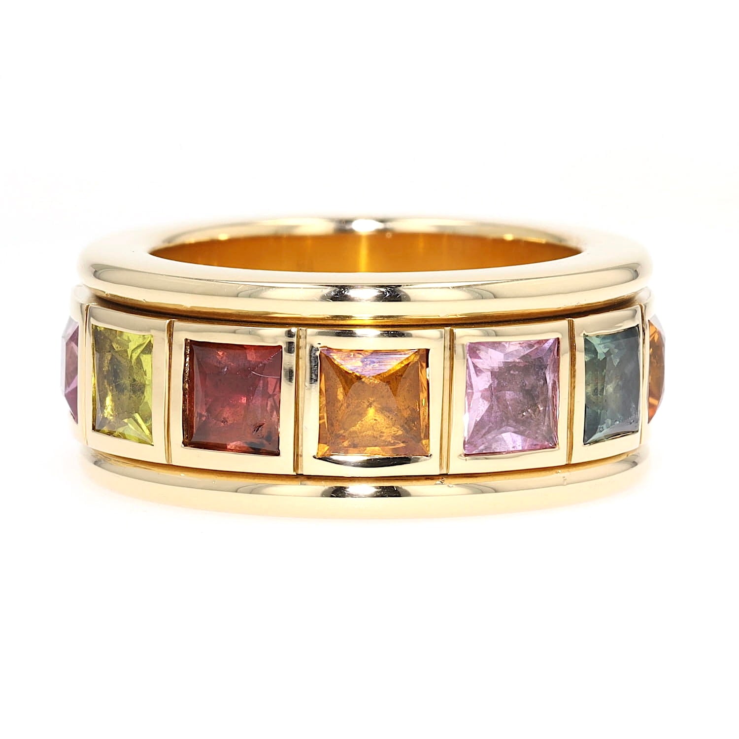 Play ring in 750 yellow gold with colorful sapphires, turned horizontally to the right