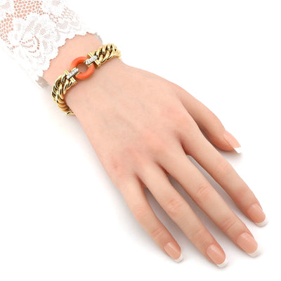 Vintage bracelet made in Italy in 750 yellow gold with brilliants and corals, on the arm