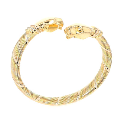 Vintage bangle by Cartier, Cougar Panthère in 750 tricolor gold, standing frontal