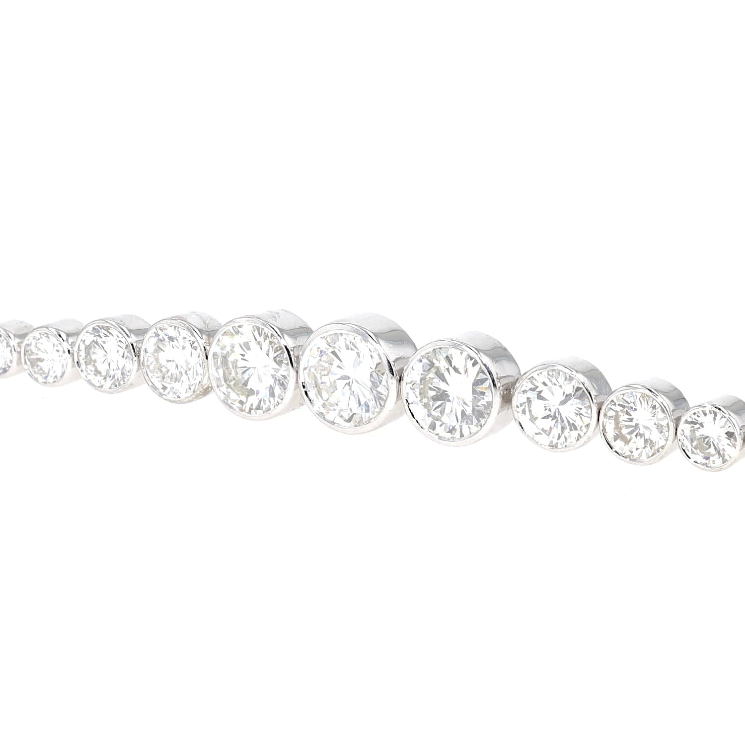 Exclusive vintage tennis bracelet in 585/750 white gold with a total of approx. 10.9 ct brilliants in very good quality, horizontal cut-out main stones turned left