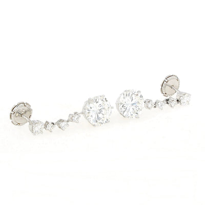 Jewel earrings in 700 white gold with a total of 10 brilliants, total approx. 6.98 ct in finest quality, large brilliants on the right side to each other